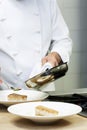 Collage of Chef cooking pan fried cod in kitchen Royalty Free Stock Photo