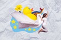 Collage composite 3d artwork template of young little cute schoolgirl jump cover herself blanket fairytale dream