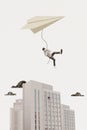 Collage 3d image of pinup pop retro sketch of funny young man hang paper plane flying over building freak bizarre Royalty Free Stock Photo