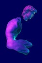 Collage with David face and sculpture of male nude torso in color neon light. Ancient statue in modern creative concept Royalty Free Stock Photo