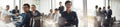 Collage of diverse businesspeople smiling while working in an office