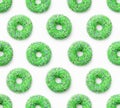 Collage of green doughnuts in glaze on a white background. Lots