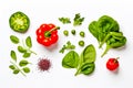 Collage of green leaves of arugula and basil, sliced red spicy and bell pepper, onion and tomatoes, black pepper peas are isolated Royalty Free Stock Photo