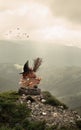 Collage of halloween witches` equipment on mountain and sky, Saints` Eve mood