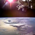 Collage image with planet Earth from the outer space and spaceship above. Royalty Free Stock Photo