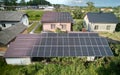 Collage of installation and ready solar panels on the roof of house. Royalty Free Stock Photo