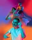 Collage made of portraits of young emotional people, boys in headphones on multicolored background in neon. Concept of Royalty Free Stock Photo