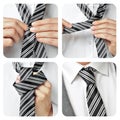 A man knotting his tie Royalty Free Stock Photo