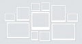 A collage of nine white, empty frames arranged symmetrically on a light gray Royalty Free Stock Photo