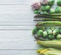 Collage of ripe green brussels sprouts, asparagus, corn and garlic Royalty Free Stock Photo