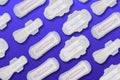 Collage of Sanitary pad or Menstrual Pads for light, regular and heavy flow on a purple background