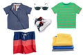 Collage set of children clothes. Denim jeans or pants, shoes, two shirts, glasses, sneaker and shorts for child boy isolated on a Royalty Free Stock Photo