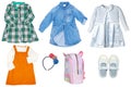 Collage set of little girls summer clothes isolated on a white background. The collection of stylish dresses, a denim dress, shoes Royalty Free Stock Photo