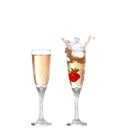 collage Single Strawberry splashing into a glass of champagne Royalty Free Stock Photo