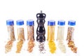 Different spices jars and pepper mill Royalty Free Stock Photo