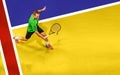 Collage. Top view image of mature man, professional male tennis player in motion, training, playing against multicolored Royalty Free Stock Photo