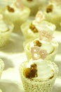 Collage of various cupcakes: vanilla in decorative cup Royalty Free Stock Photo
