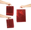 Collage of women holding paper shopping bags on background, closeup Royalty Free Stock Photo