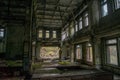 Collapsed, abandoned, messy, old. creepy, room with windows covered in the building located in the Chernobyl ghost town