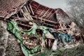 Collapsed anciend barn on foggy day Royalty Free Stock Photo