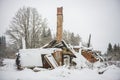 Collapsed house in snow