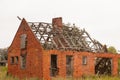 The collapsed red house