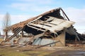 Collapsed Roof Of Old Farmstead Barn
