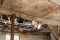 Collapsed roof of the total damaged domestic house indoor from natural disaster or catastrophe Royalty Free Stock Photo