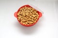 Collapsible red silicone container for microwave popcorn