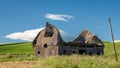 Collapsing barn in a farmer's field