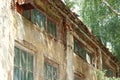 Collapsing building. Abandoned factory shop. Broken glass, crumbling bricks