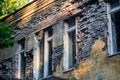 Collapsing outer wall of an old brick building Royalty Free Stock Photo