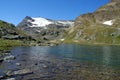 Colle del Nivolet, Piedmont Italy: panoramic view of the mountains and a lake