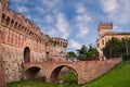 Colle di Val d`Elsa, Siena, Tuscany, Italy: the ancient city walls with moat, bridge and city gate Royalty Free Stock Photo