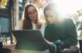 Colleague communicate on project, girls shopping online tablet in cafe outdoor. Students studies on internet. Working business Royalty Free Stock Photo