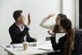 Colleagues giving high five celebrating shared success Royalty Free Stock Photo