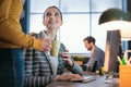 Colleagues having a coffee break together Royalty Free Stock Photo