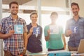 Colleagues holding sign from famous social networks