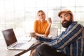 Colleagues sit and drink coffee. Relax after office work Royalty Free Stock Photo