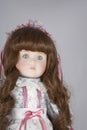 Collectable Porcelain doll on white Royalty Free Stock Photo