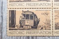 Collectible stamps featuring an old cable car in San Francisco