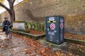 Collecting knives saving lives safe disposal bin box at St John at Hackney churchyard garden. Royalty Free Stock Photo