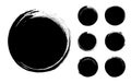 Collection of abstract brushed black ink circles with rough edges and grungy texture Royalty Free Stock Photo