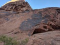 Collection of ancient petroglyphs on mountain in Valley of Fire Nevada Royalty Free Stock Photo