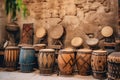 Collection of ancient vintage wooden drums. Oriental musical instruments. Generative AI