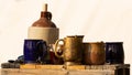 A collection of antique mugs and jug