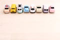 Collection of antique toy cars. Small colorful toy cars on the floor background Royalty Free Stock Photo