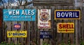 Collection of antique Victorian metal product advertising signs in Ironbridge, Shropshire, UK