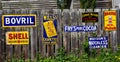 Collection of antique Victorian metal product advertising signs in Ironbridge, Shropshire, UK