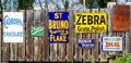 Collection of antique Victorian metal product advertising signs in Ironbridge, Shropshire, UK